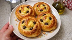 Girelle danesi alla crema e uvetta: brioches soffici con doppia lievitazione